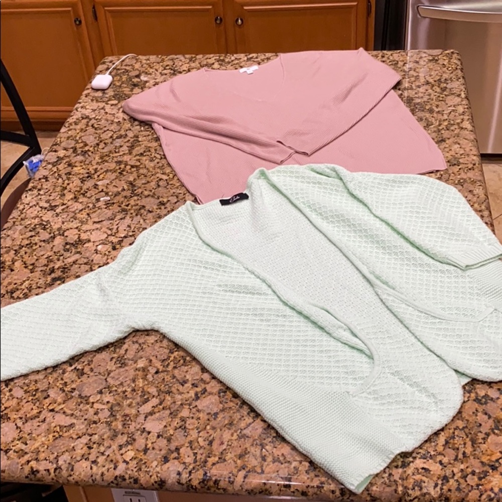 1 cardigan. 1 Vneck sweater